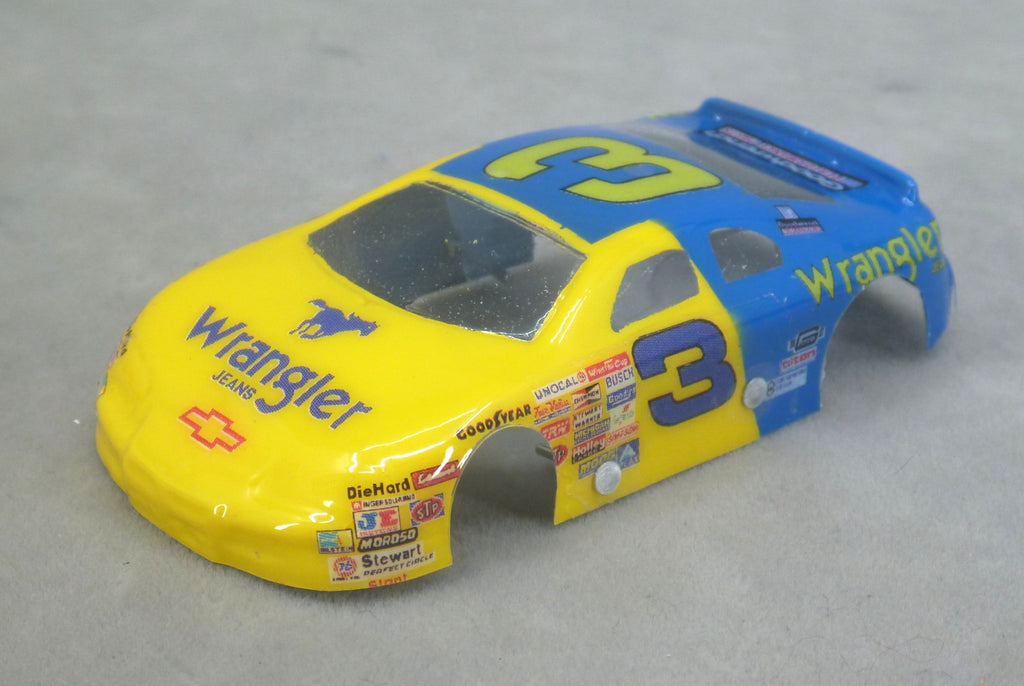Front three-quarter view of yellow and blue Wrangler number 3 painted Lexan NASCAR HO slot car body
