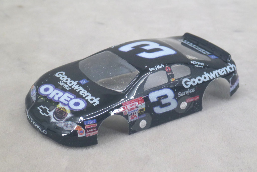 Front three-quarter view of black Oreo #3 painted Lexan HO slot car body