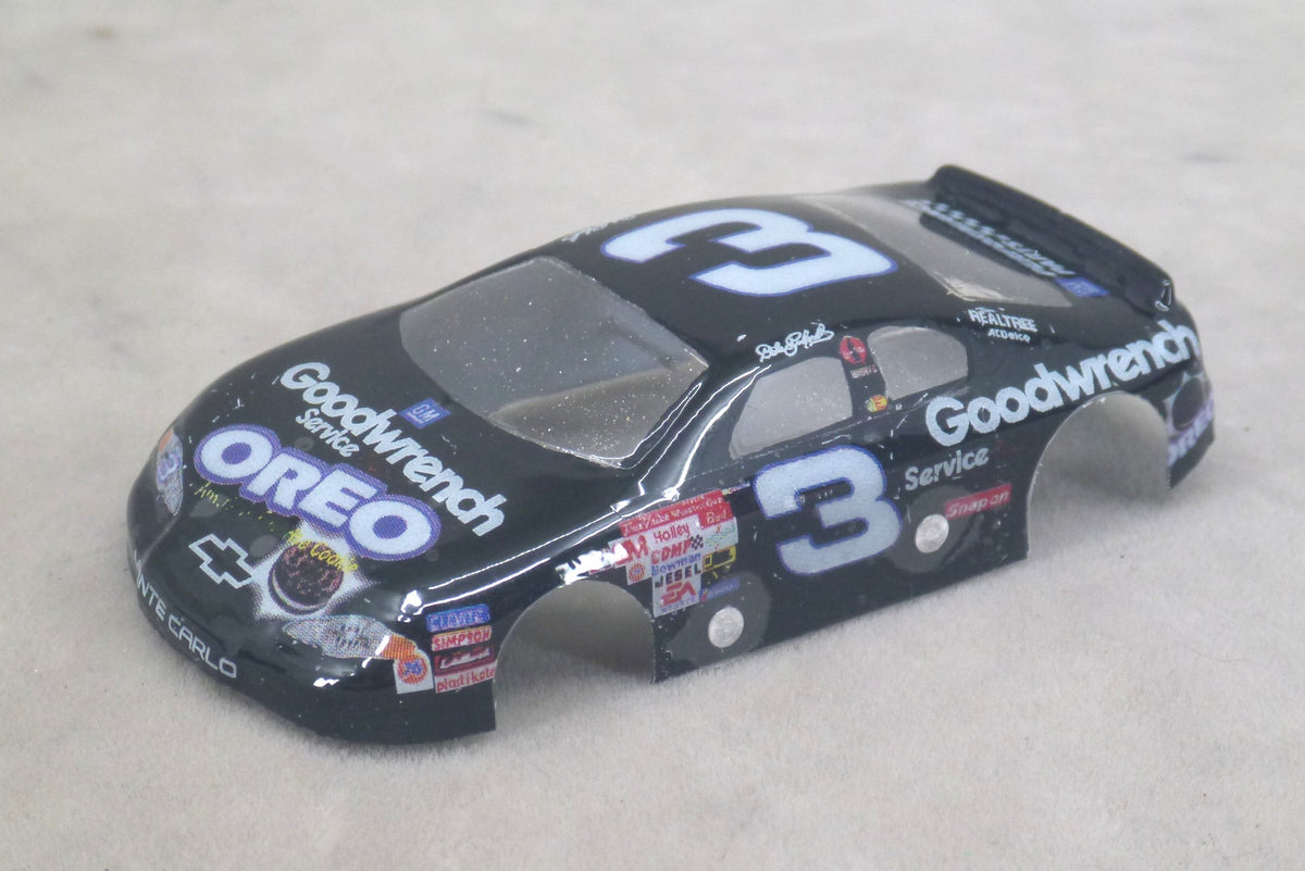 Front three-quarter view of black Oreo #3 painted Lexan HO slot car body