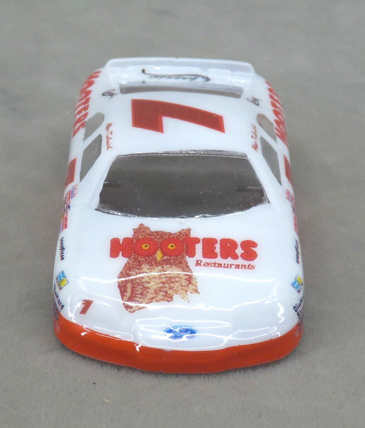 Front view of Hooters #7 painted Lexan HO slot car body with owl hood graphics and orange bumper