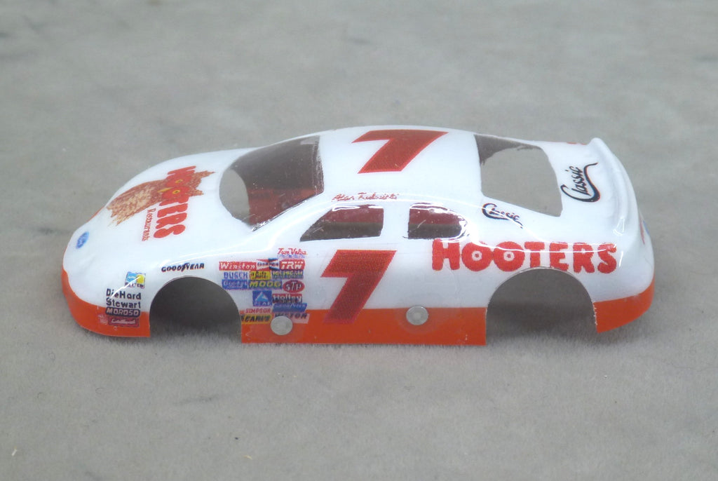 Left side of white and orange Hooters #7 painted Lexan HO slot car body with sponsor graphics