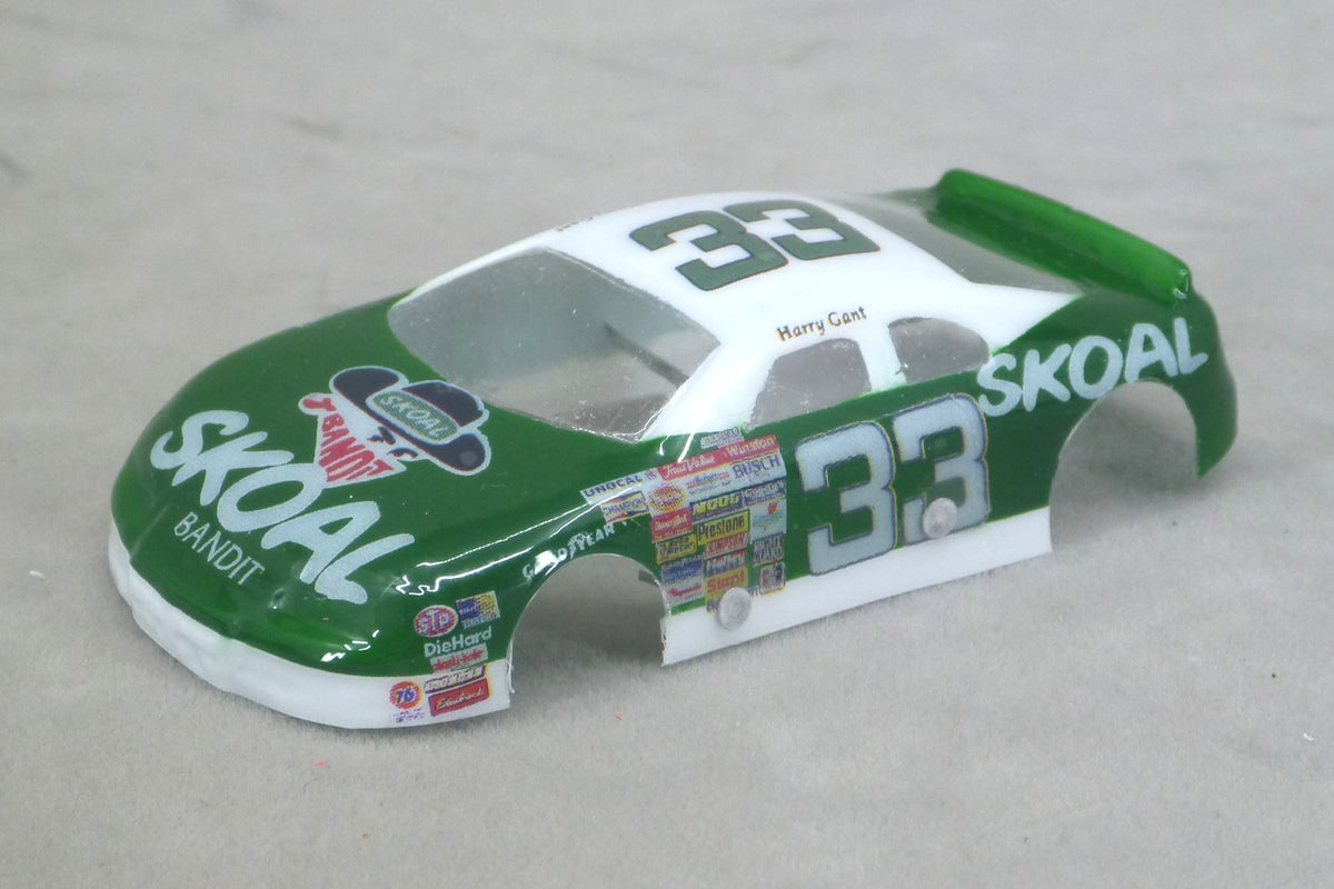 Front three-quarter view of green and white Skoal #33 painted Lexan HO slot car body